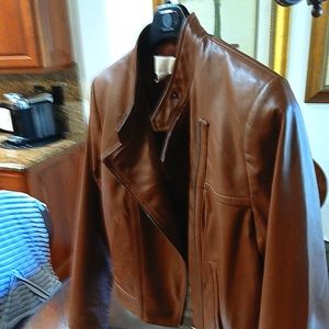 Camel brown Bolero leather jacket by Michael Kors.
